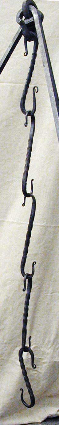 Michael, Carolyn, Jeremy, Mason, and Andy's 'S' hooks, hanging from a tripod